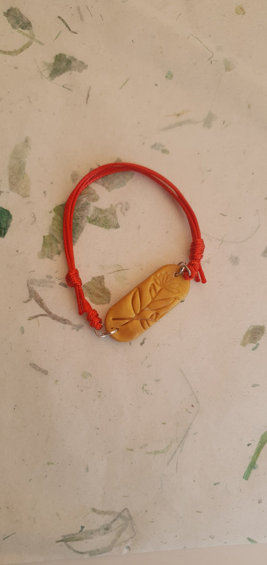 Bracelet ocre jaune et rouge