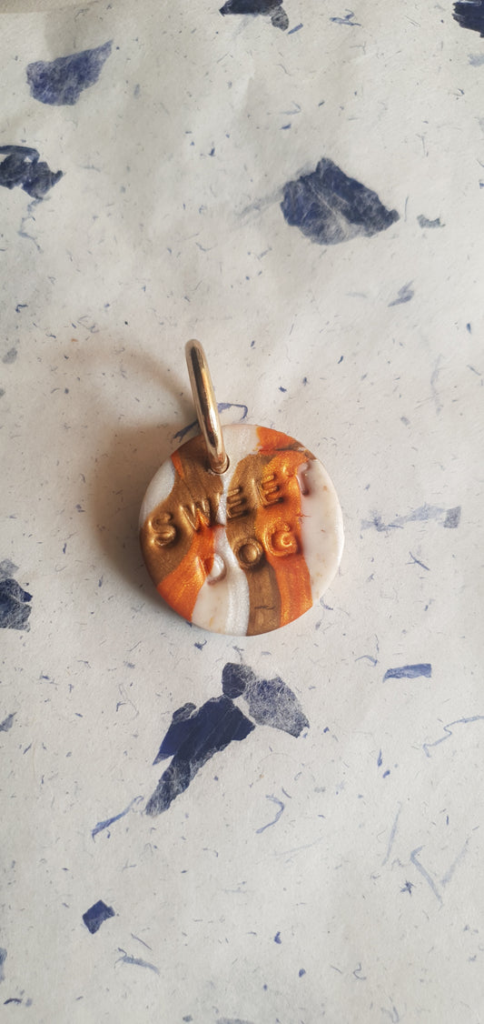 Médaille  or orange et blanche pour chien