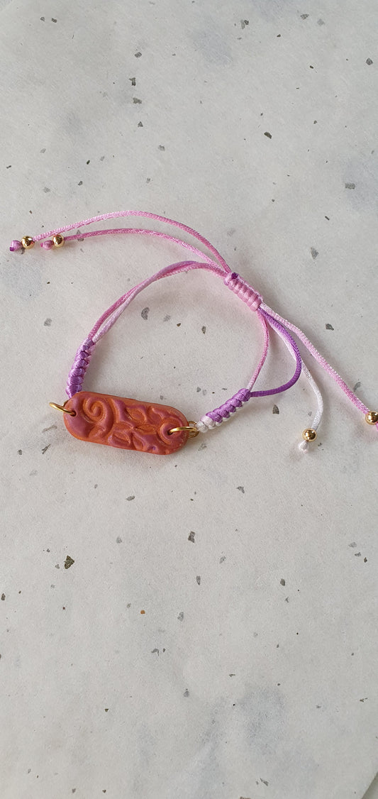 Bracelet orange et rose motif arrondi