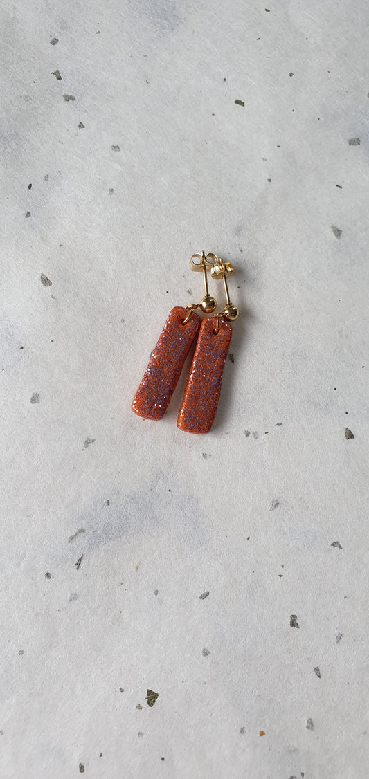 Boucles d’oreilles longues orange paillettes